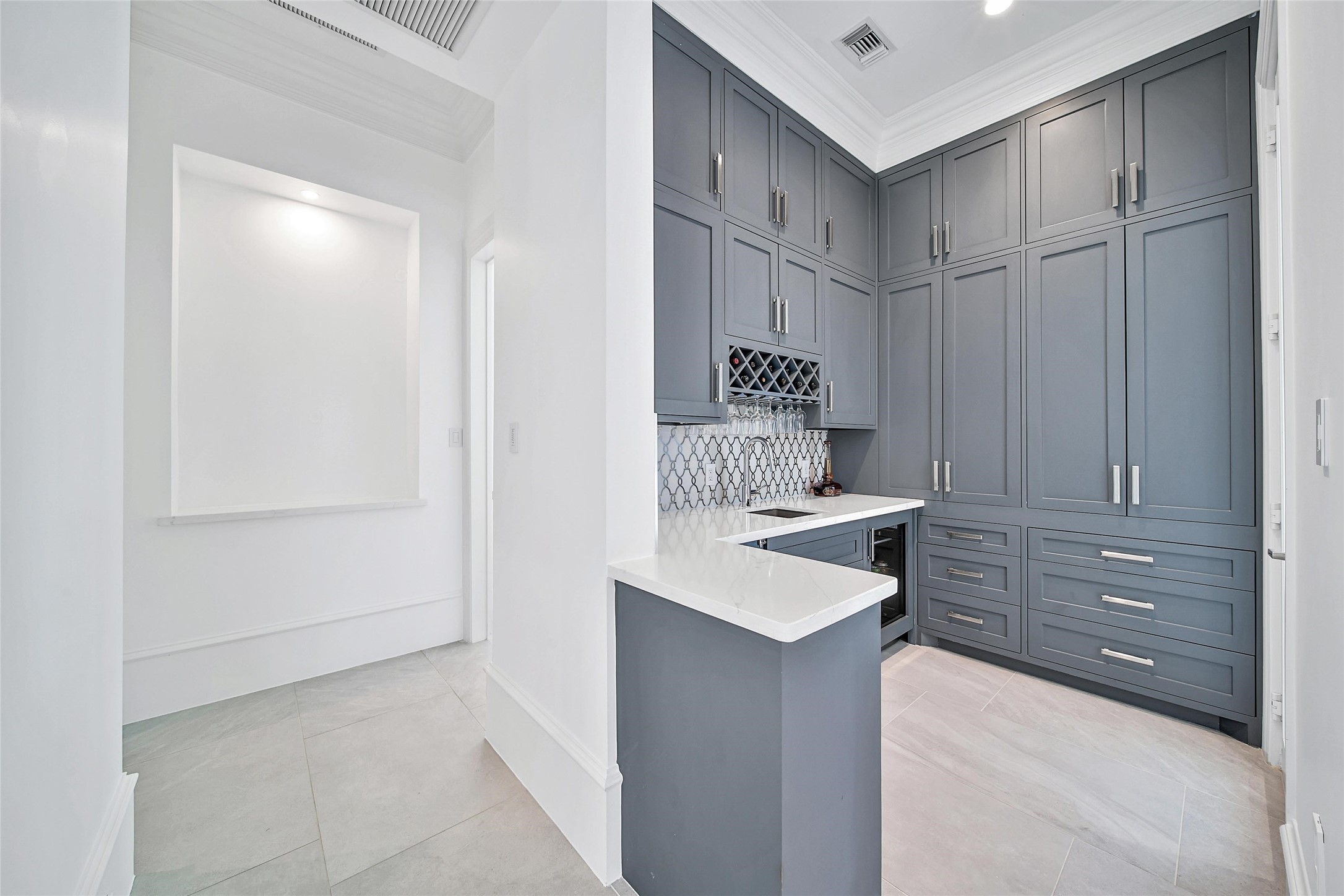24357 East Webb Road Porter, TX 77365 - Photo 12 of 50 a kitchen with a sink and cabinets