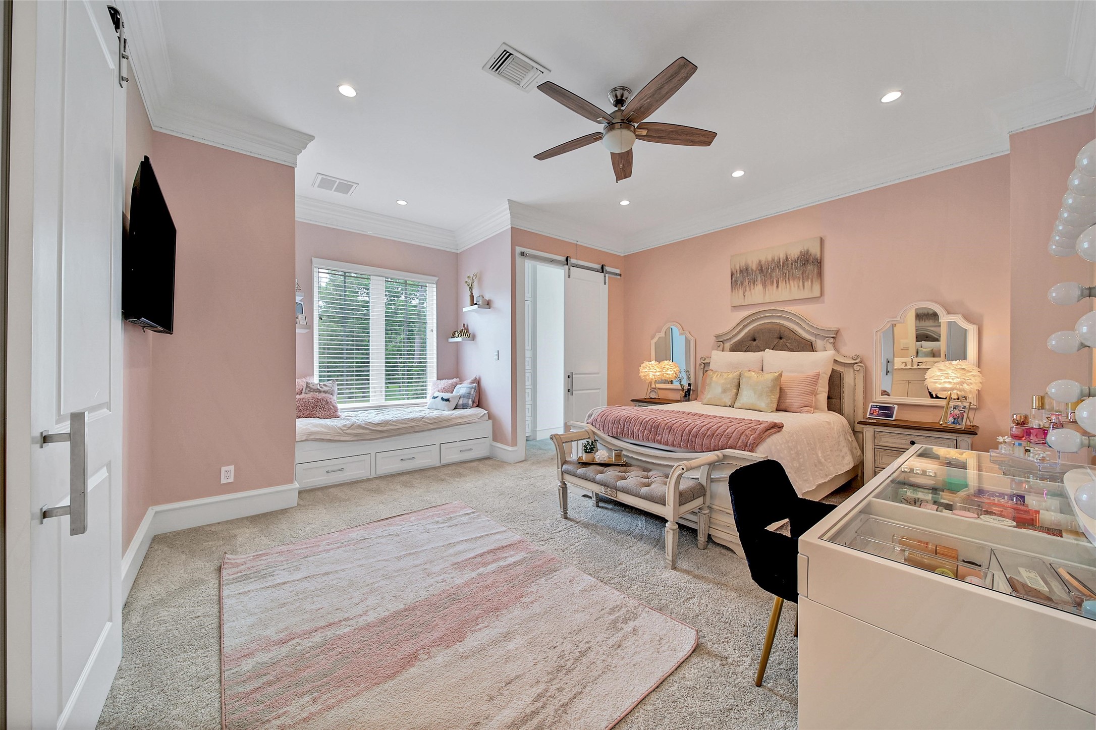 24357 East Webb Road Porter, TX 77365 - Photo 21 of 50 a bedroom with a bed and a large window