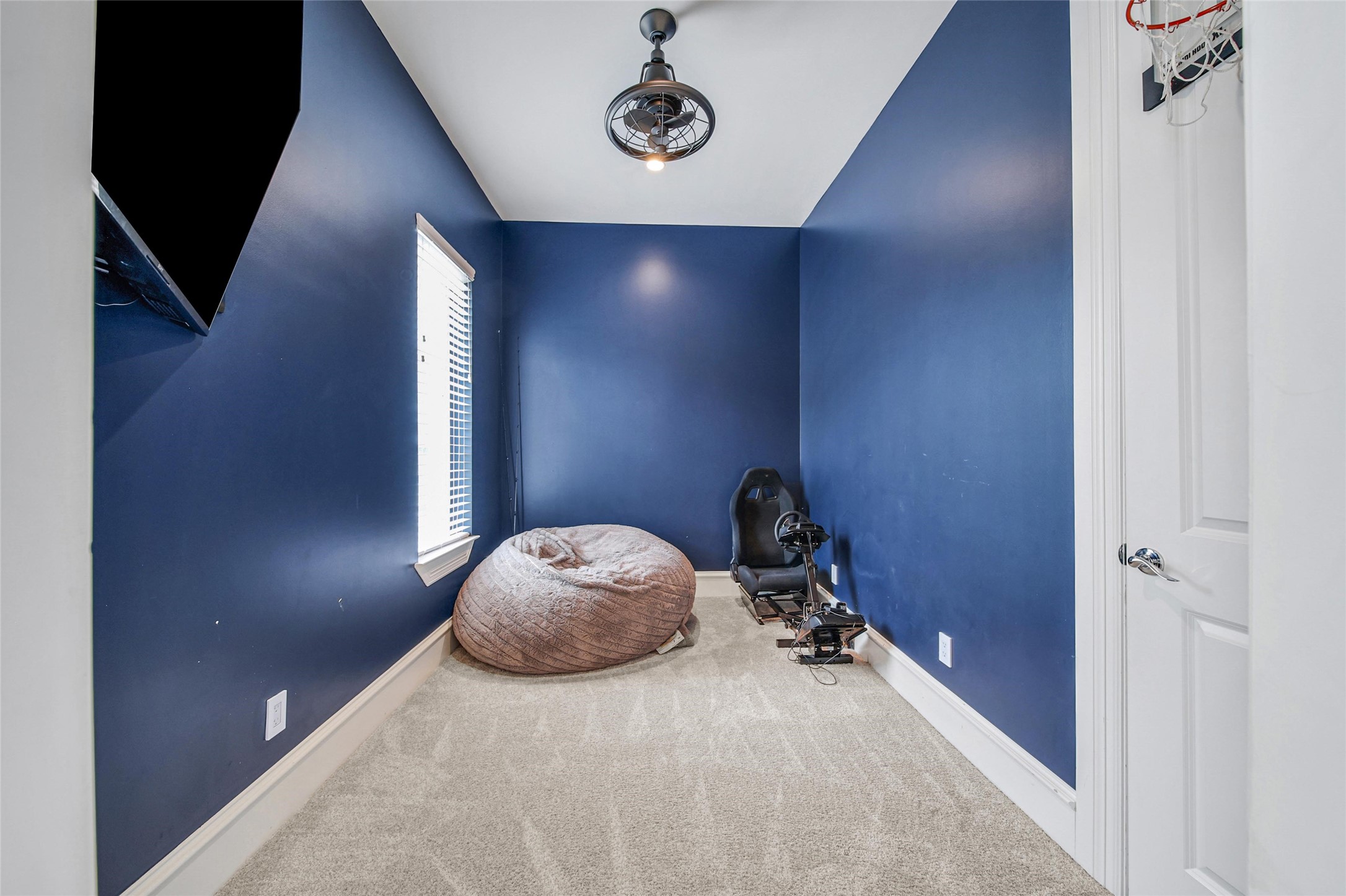 24357 East Webb Road Porter, TX 77365 - Photo 32 of 50 a view of a livingroom with a chair