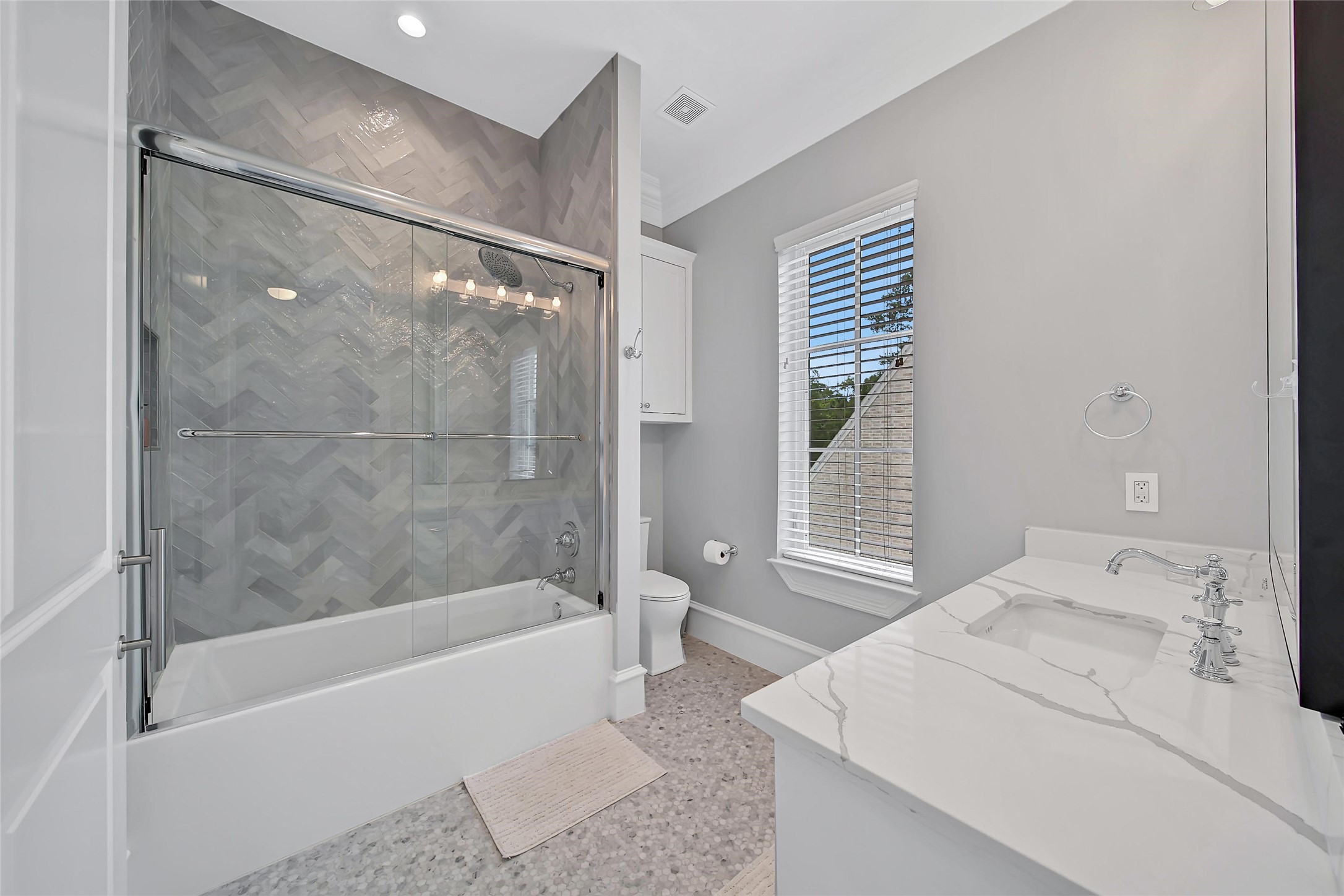 24357 East Webb Road Porter, TX 77365 - Photo 35 of 50 a bathroom with a bathtub and a shower