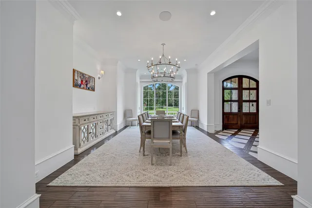 a view of a livingroom with furniture window and wooden floor