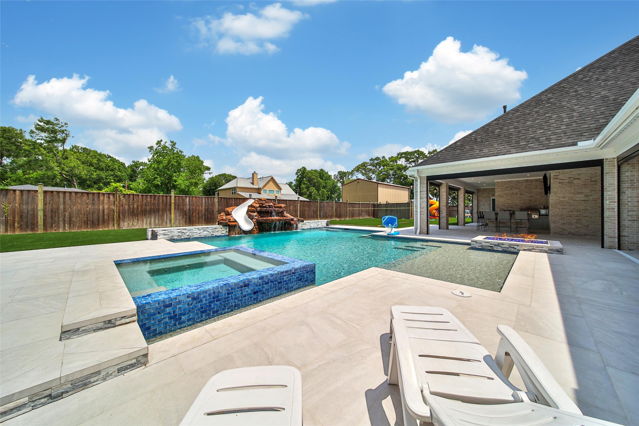 24357 East Webb Road Porter, TX 77365 - Photo 42 of 50 a view of yard with swimming pool and outdoor seating