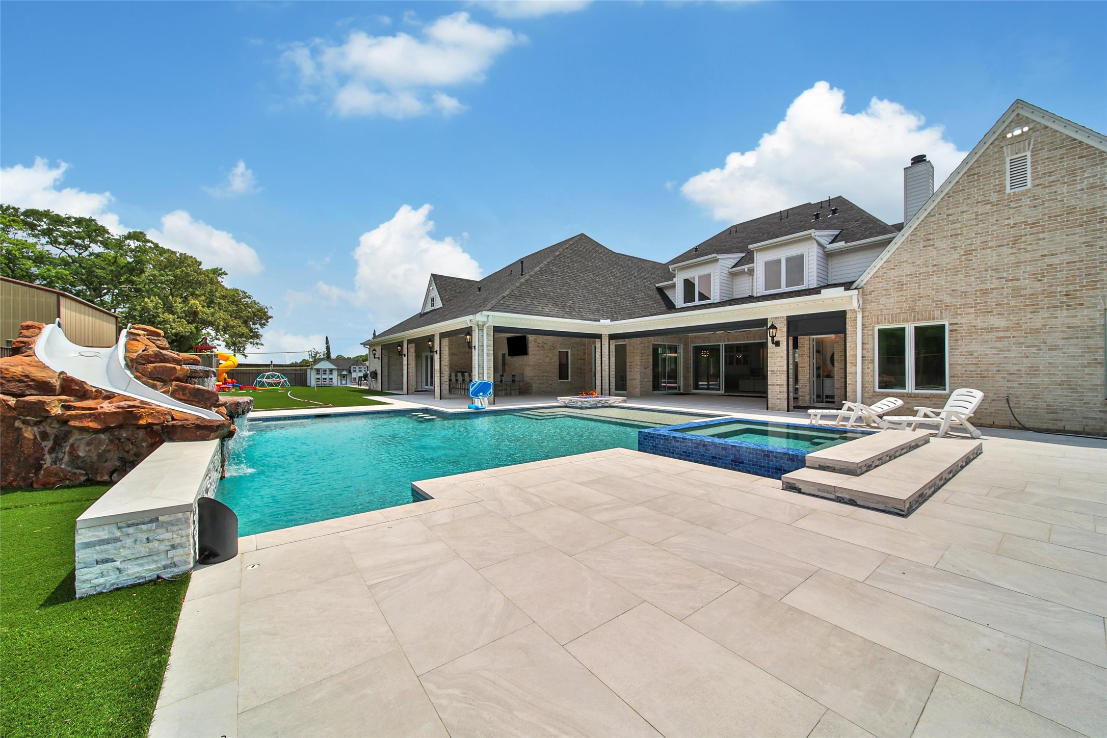 24357 East Webb Road Porter, TX 77365 - Photo 43 of 50 a view of a house with a yard and potted plants