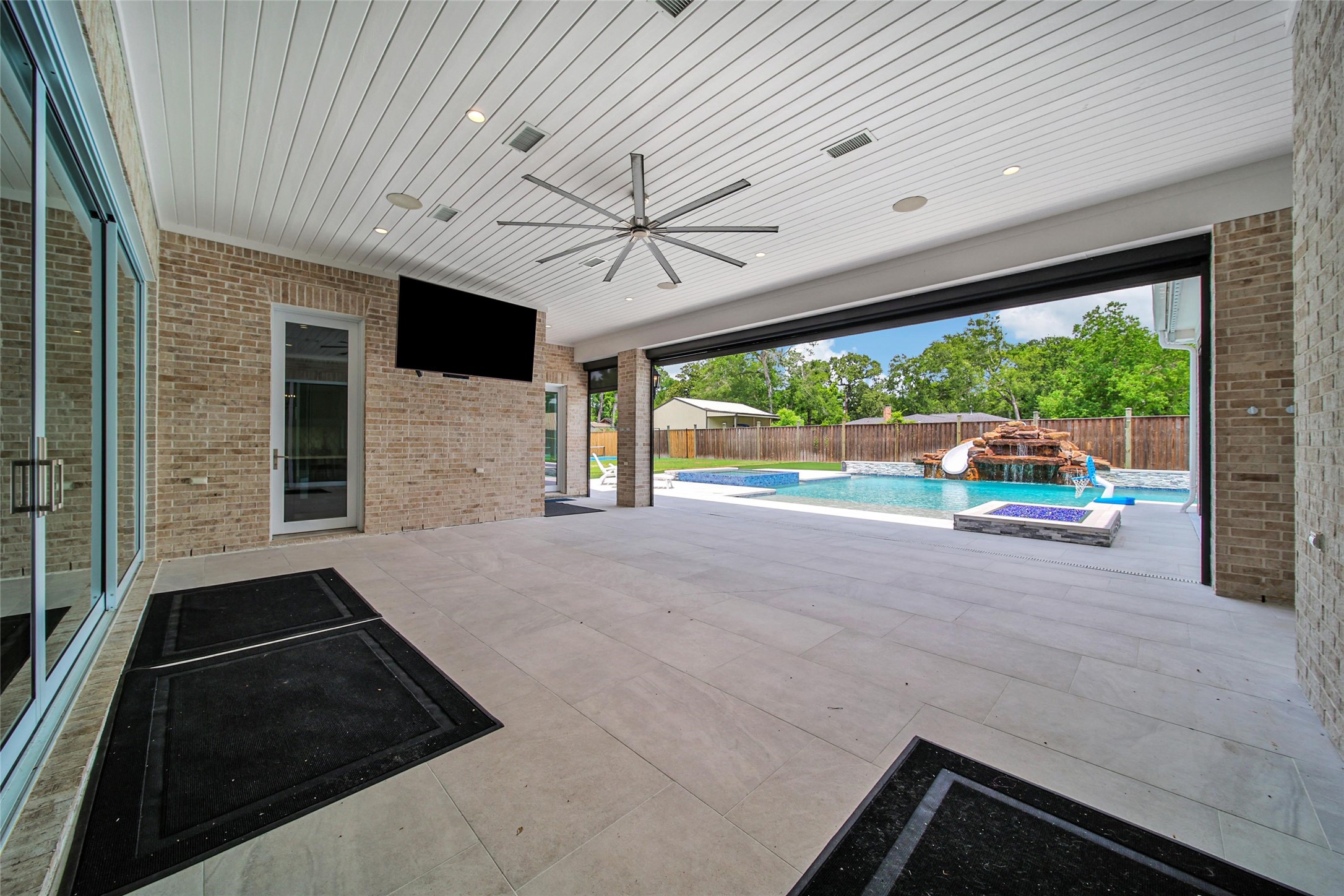 24357 East Webb Road Porter, TX 77365 - Photo 45 of 50 a living room filled with furniture and a large window