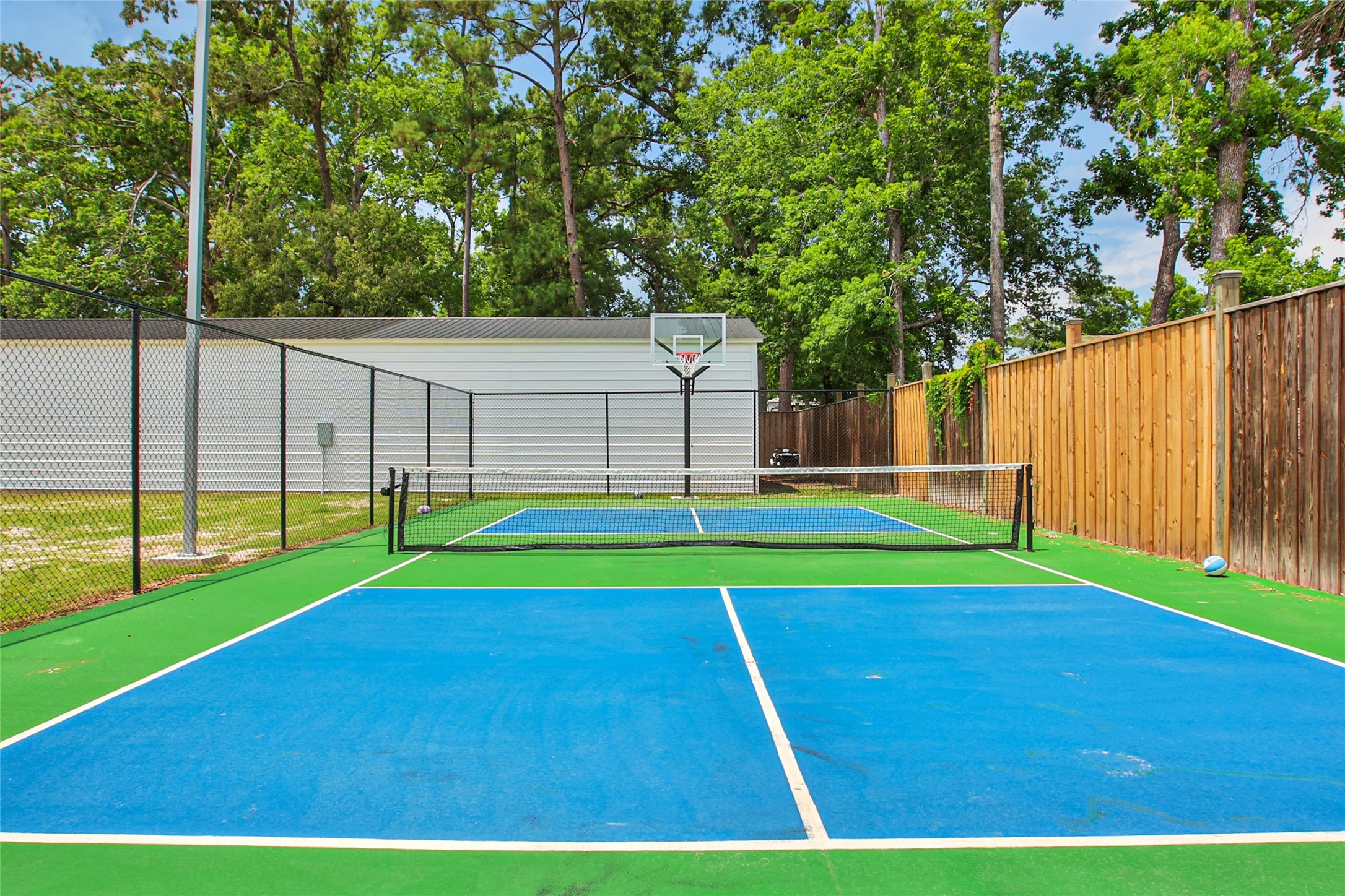 24357 East Webb Road Porter, TX 77365 - Photo 48 of 50 a view of a backyard with swimming pool