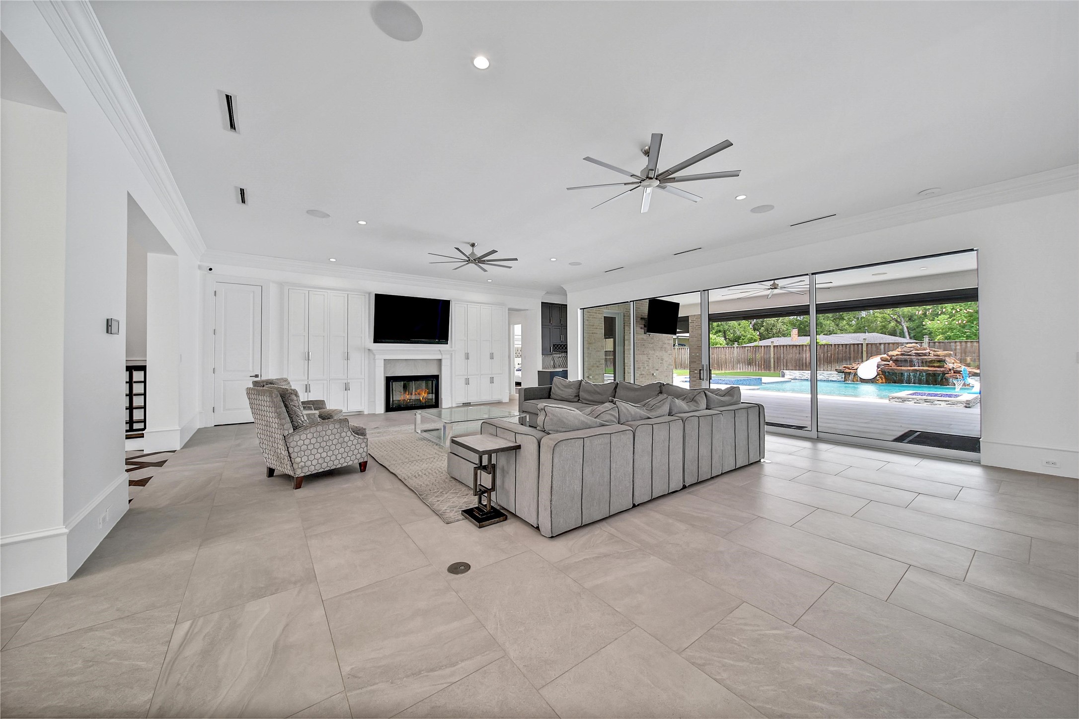24357 East Webb Road Porter, TX 77365 - Photo 7 of 50 a living room with furniture and a flat screen tv