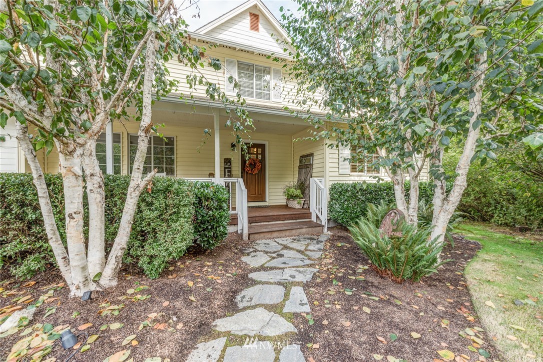 2633 189th Street Southeast Bothell, WA 98012 - Photo 2 of 35 a front view of a house with garden