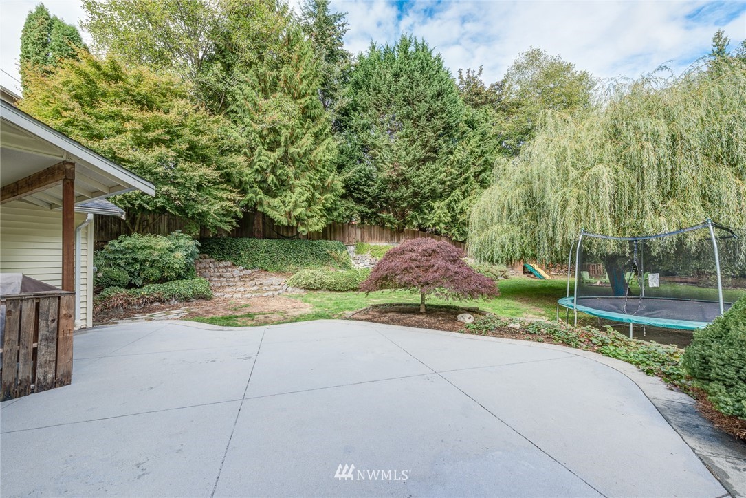 2633 189th Street Southeast Bothell, WA 98012 - Photo 15 of 35 a view of a street with a large trees