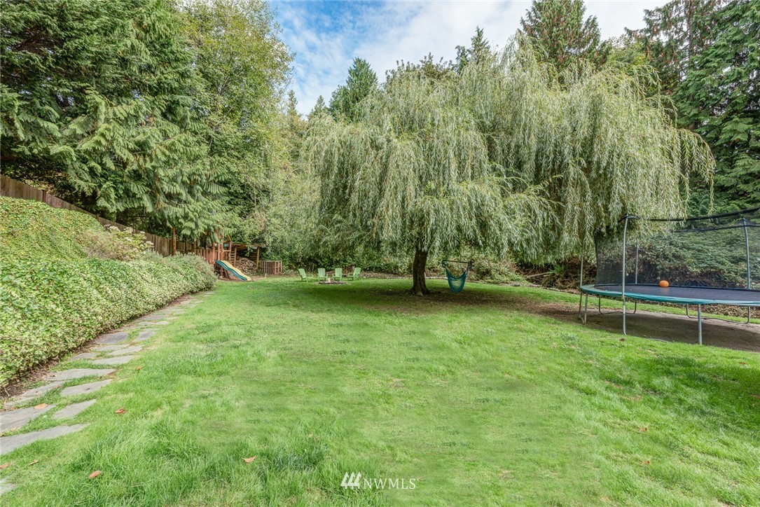 2633 189th Street Southeast Bothell, WA 98012 - Photo 16 of 35 a view of outdoor space with deck and yard