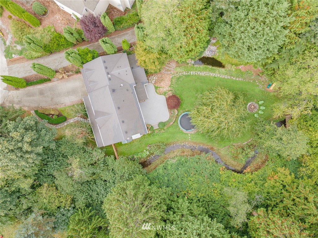 2633 189th Street Southeast Bothell, WA 98012 - Photo 17 of 35 an aerial view of a house with a yard and trees