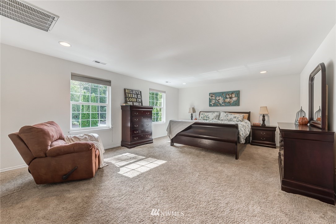 2633 189th Street Southeast Bothell, WA 98012 - Photo 24 of 35 a living room with furniture and a window