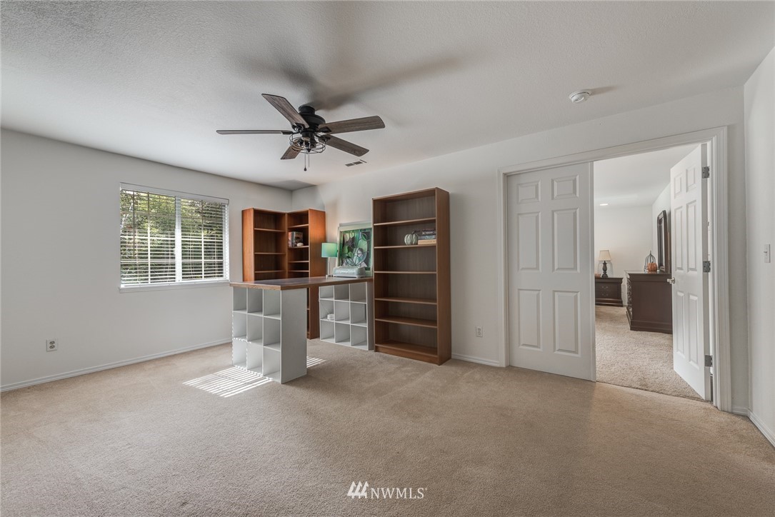 2633 189th Street Southeast Bothell, WA 98012 - Photo 29 of 35 a view of workspace with furniture and window