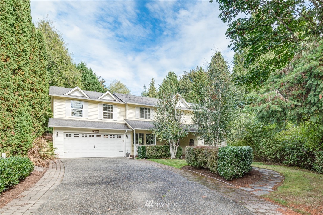 2633 189th Street Southeast Bothell, WA 98012 - Photo 33 of 35 a view of a house with a yard and potted plants