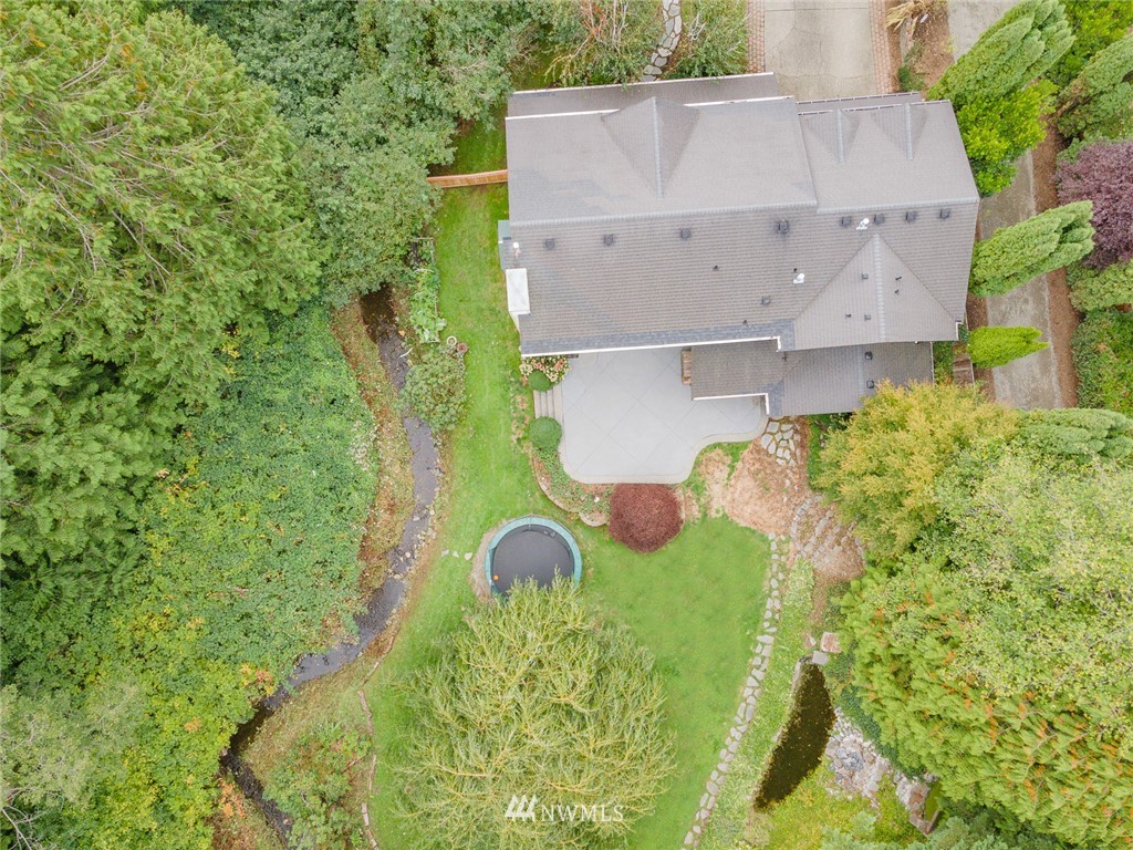 2633 189th Street Southeast Bothell, WA 98012 - Photo 35 of 35 an aerial view of a house with yard and green space