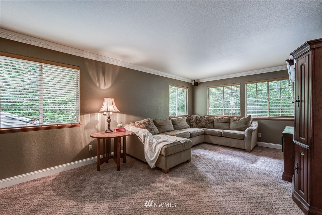 2633 189th Street Southeast Bothell, WA 98012 - Photo 6 of 35 a living room with furniture and a large window