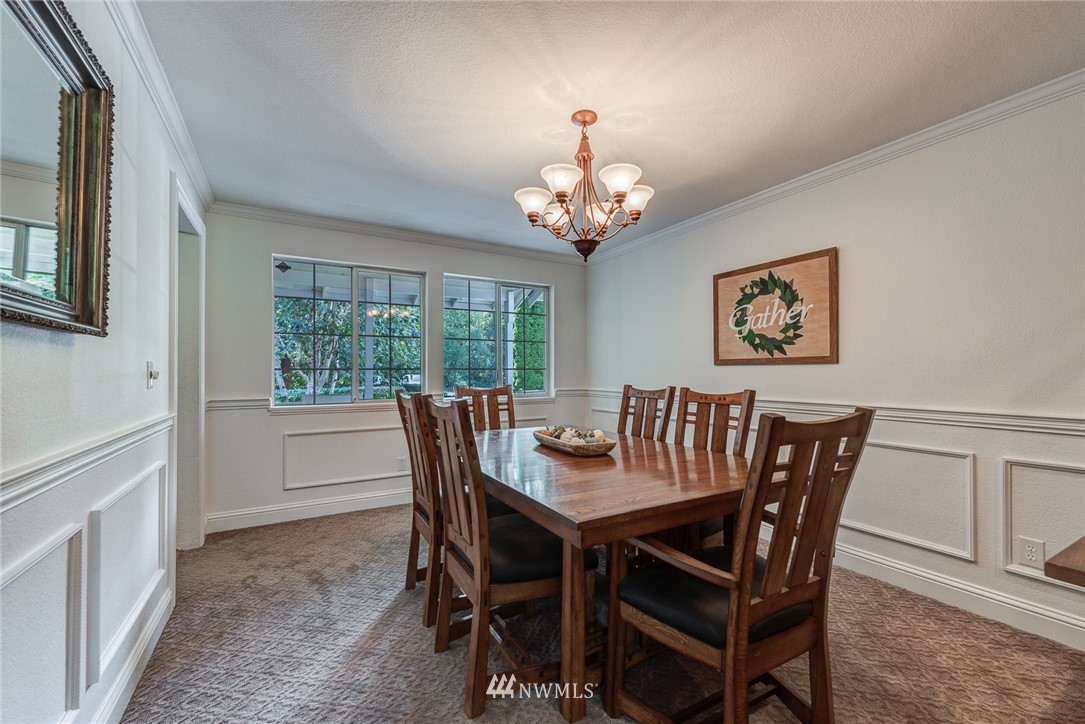 2633 189th Street Southeast Bothell, WA 98012 - Photo 9 of 35 a view of a dining room with furniture window and outside view