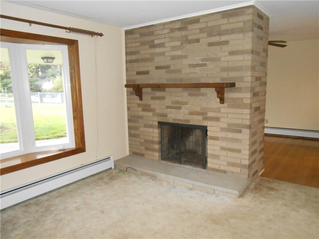 206 Hamtom Road Eighty Four, PA 15330 - Photo 5 of 21 an empty room with a fireplace
