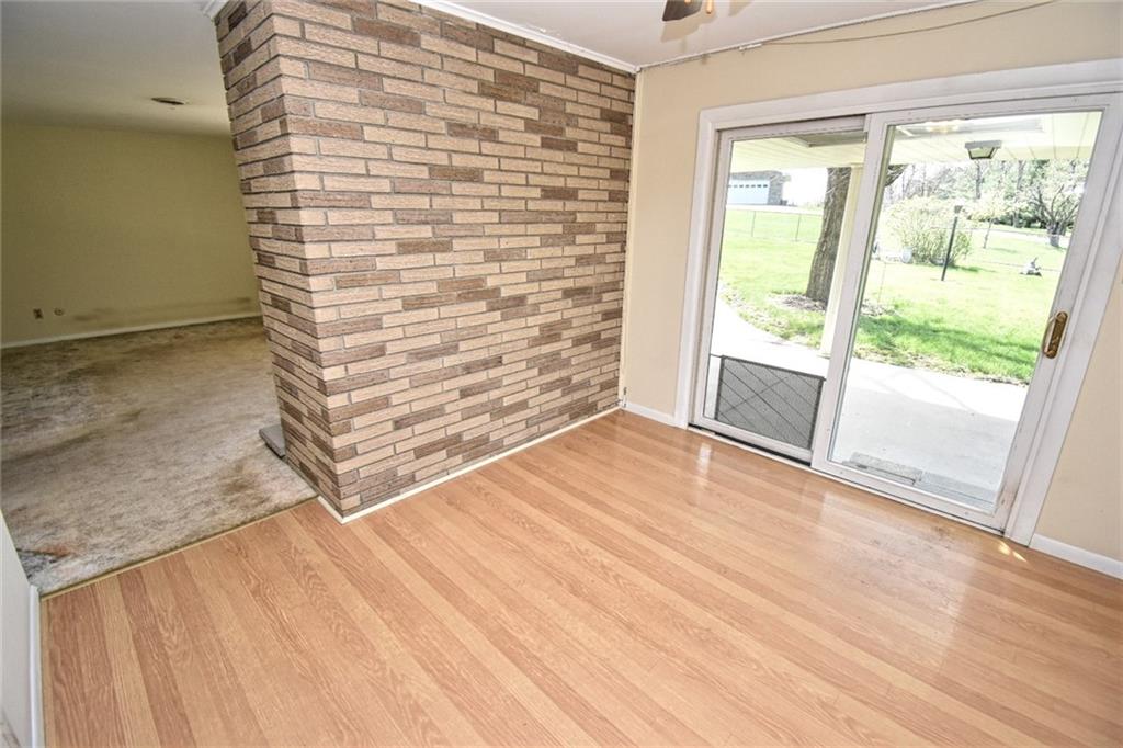 206 Hamtom Road Eighty Four, PA 15330 - Photo 6 of 21 a view of empty room with wooden floor and fan