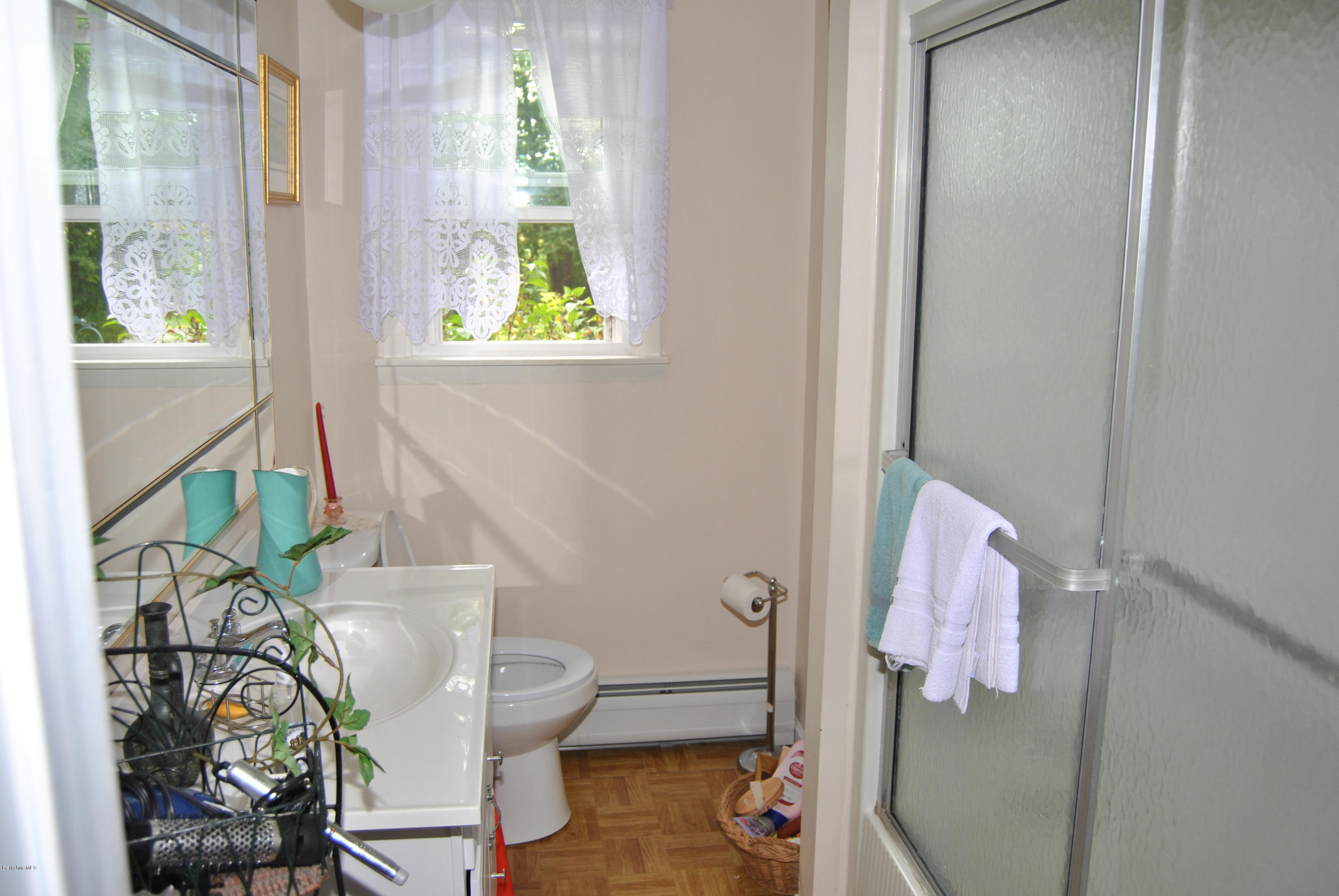 48 Alum Hill Road New Marlborough, MA 01259 - Photo 11 of 19 a bathroom with a toilet and a shower