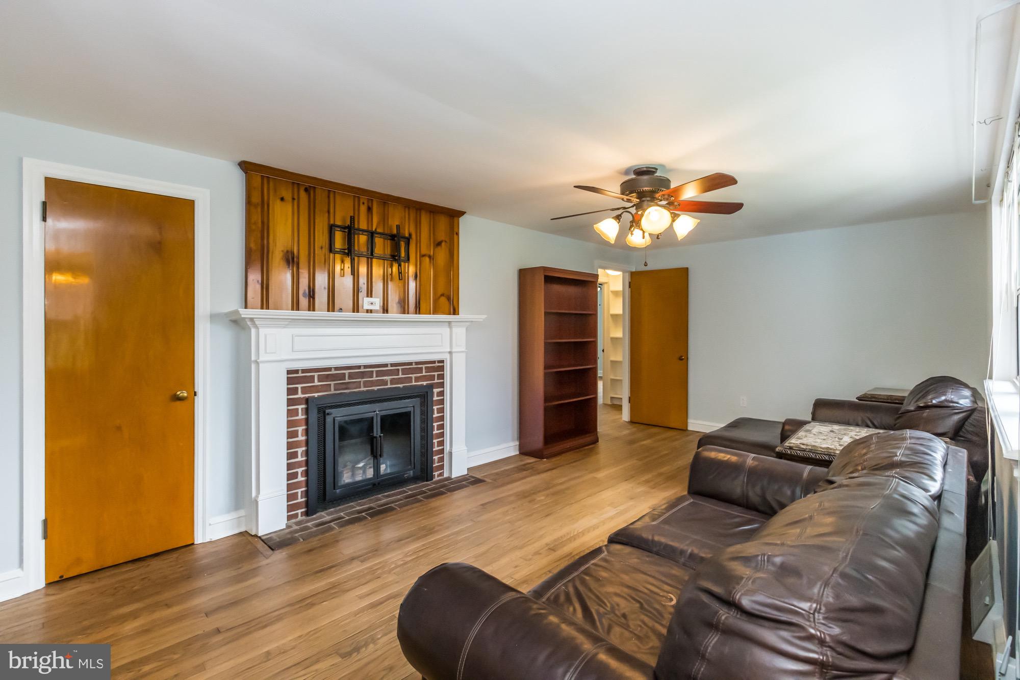 1039 Cardinal Road Audubon, PA 19403 - Photo 4 of 40 Living Room with Wood Burning Fireplace