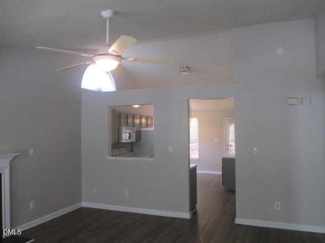 5409 Botany Bay Drive Raleigh, NC 27616 - Photo 4 of 14 wooden floor in an empty room with a window