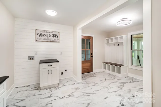 a bedroom with a bed and a cabinets