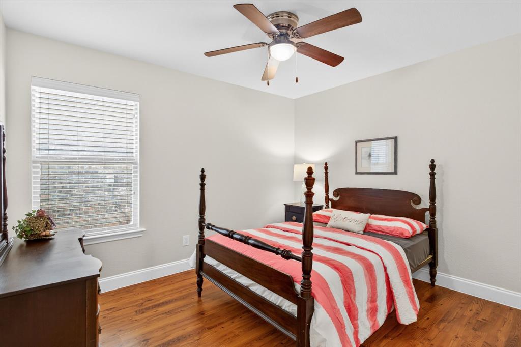 5069 Britton Ridge Lane Fort Worth, TX 76179 - Photo 21 of 32 Secondary bedroom in opposite hallway. All the same pretty finishes.