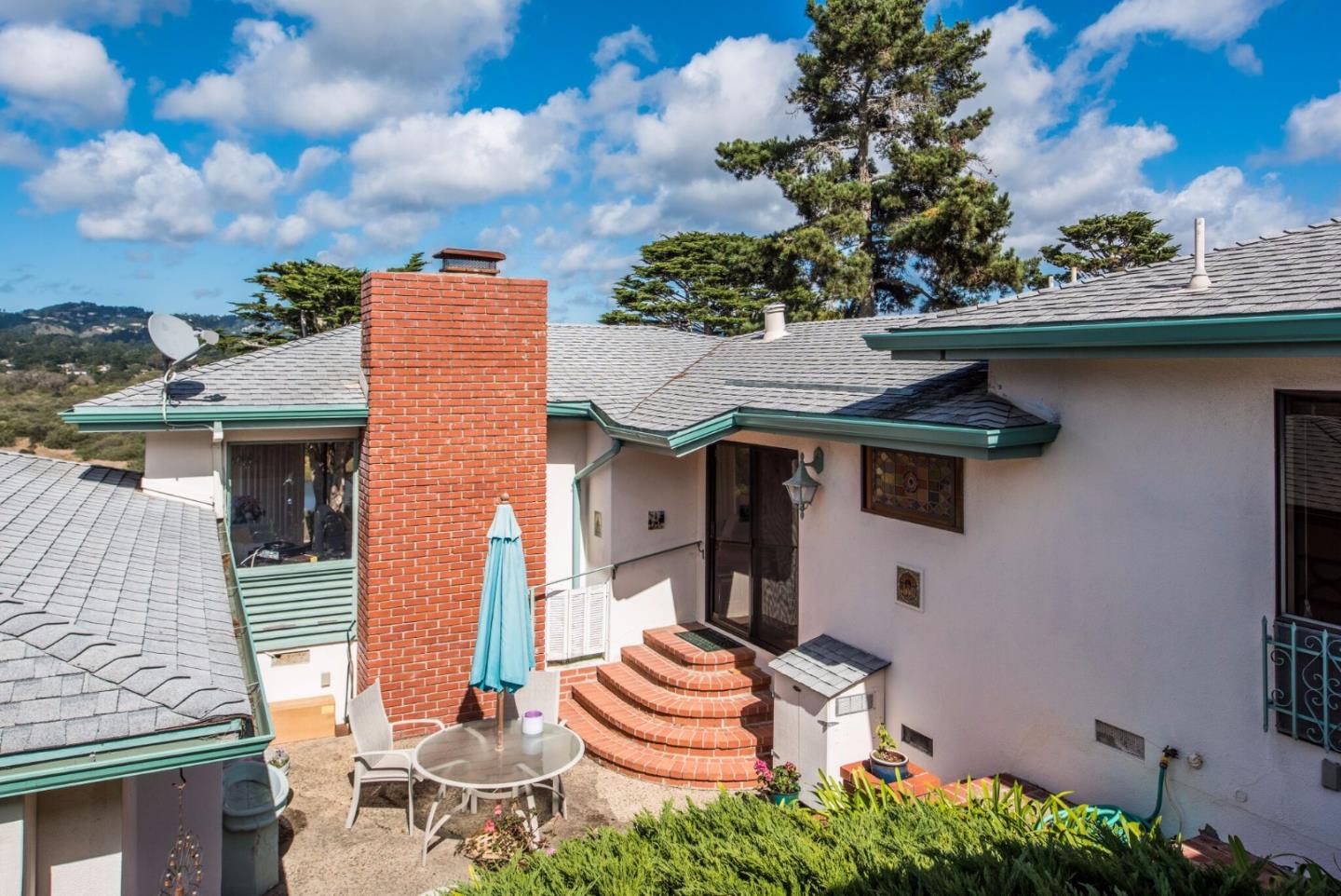 2900 Ribera Road Carmel, CA 93923 - Photo 4 of 18 a front view of a house with a garden