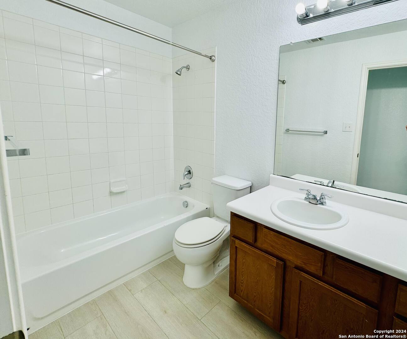 12139 Patton Point San Antonio, TX 78254 - Photo 24 of 34 a bathroom with a sink a toilet and shower