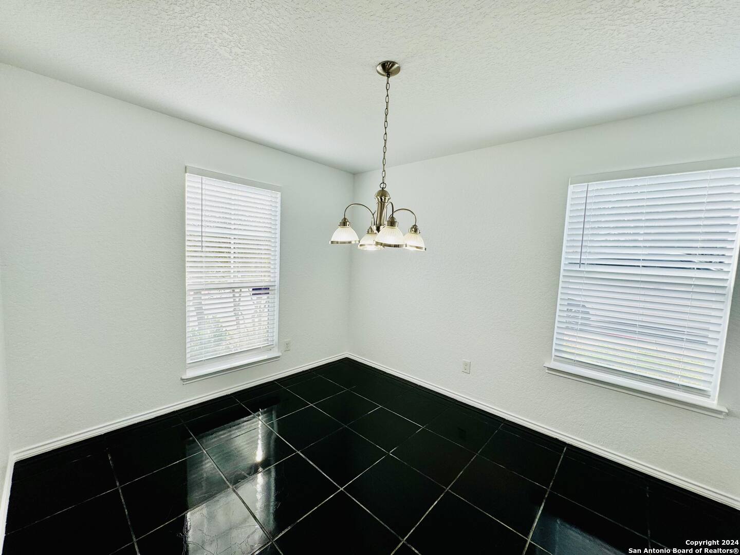 12139 Patton Point San Antonio, TX 78254 - Photo 7 of 34 a view of a room with a large window