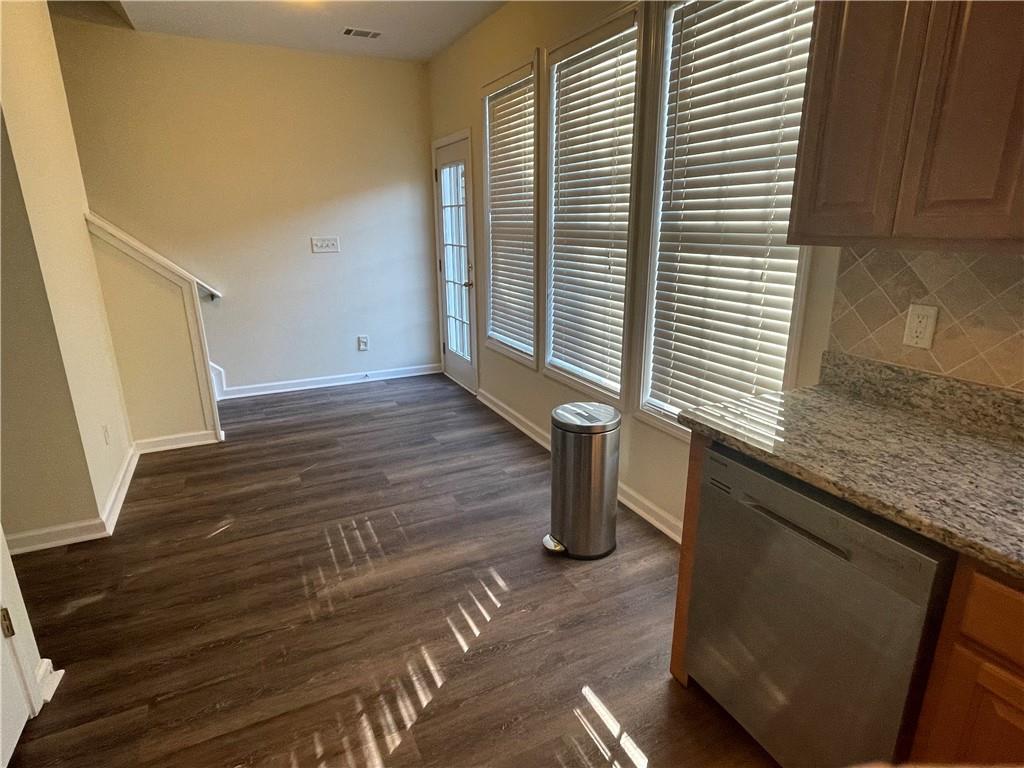 2970 Wintercrest Trace Atlanta, GA 30360 - Photo 12 of 15 a view of a kitchen with wooden floor and a window
