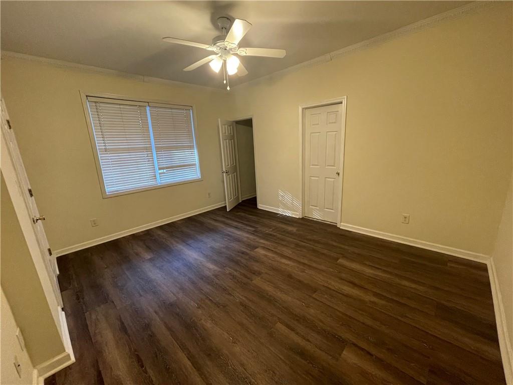 2970 Wintercrest Trace Atlanta, GA 30360 - Photo 13 of 15 a view of an empty room with wooden floor and a window