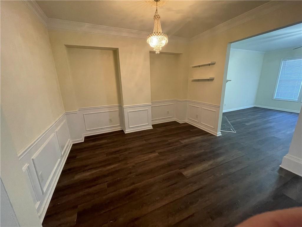 2970 Wintercrest Trace Atlanta, GA 30360 - Photo 14 of 15 a view of a livingroom with wooden floor and white walls