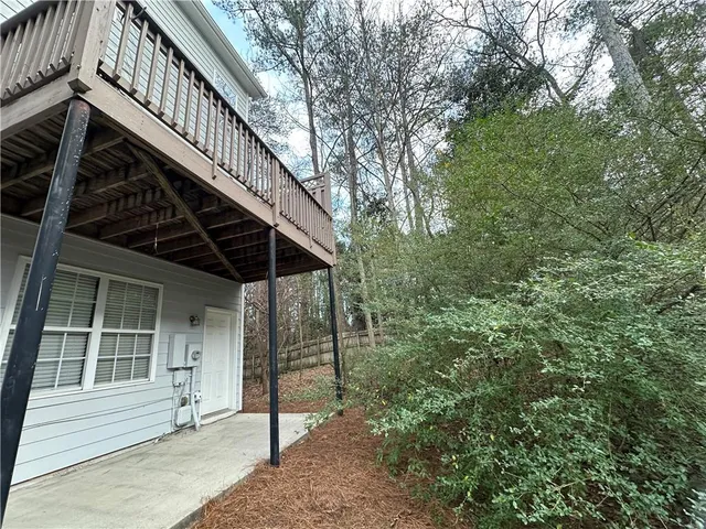 a view of house with trees in the background