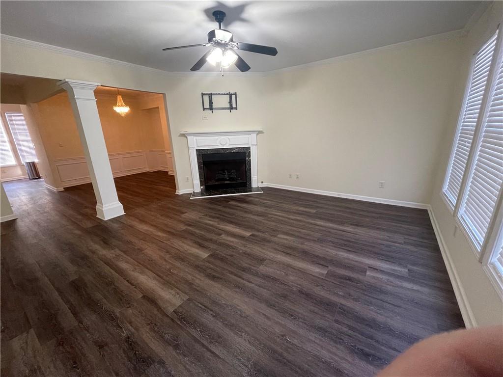 2970 Wintercrest Trace Atlanta, GA 30360 - Photo 3 of 15 a view of empty room with wooden floor and fan
