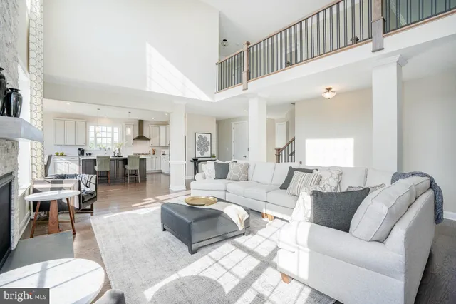 a living room with furniture or couch and a dining table
