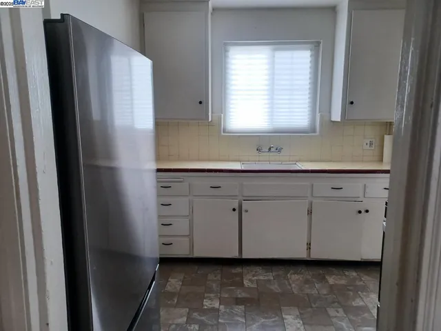 a view of a kitchen with a sink