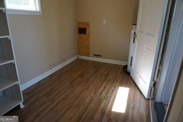 a view of a room with rack on the wall