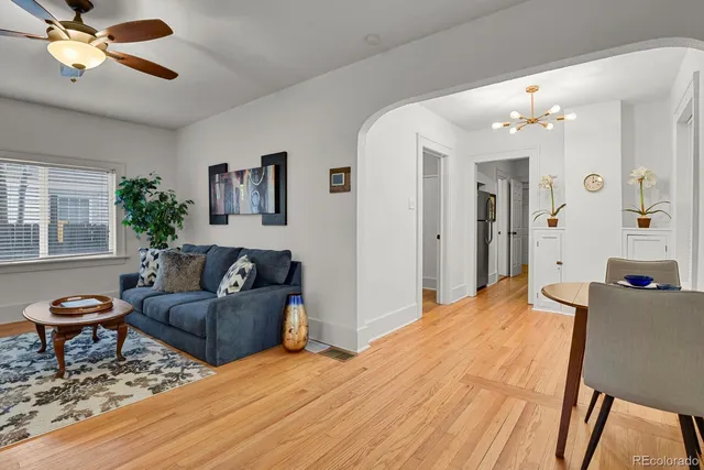 a living room with furniture and window