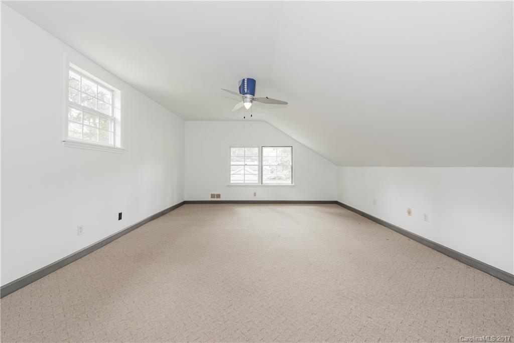 5423 Londonderry Road Charlotte, NC 28210 - Photo 13 of 16 an empty room with a window