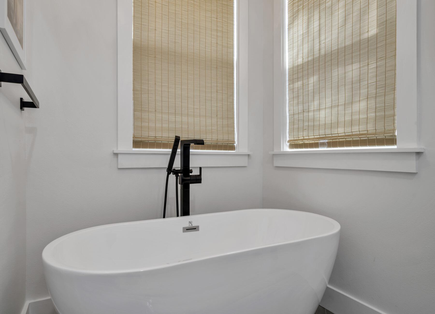 172 Baird Road Santa Rosa Beach, FL 32459 - Photo 17 of 46 a white bath tub sitting in a bathroom
