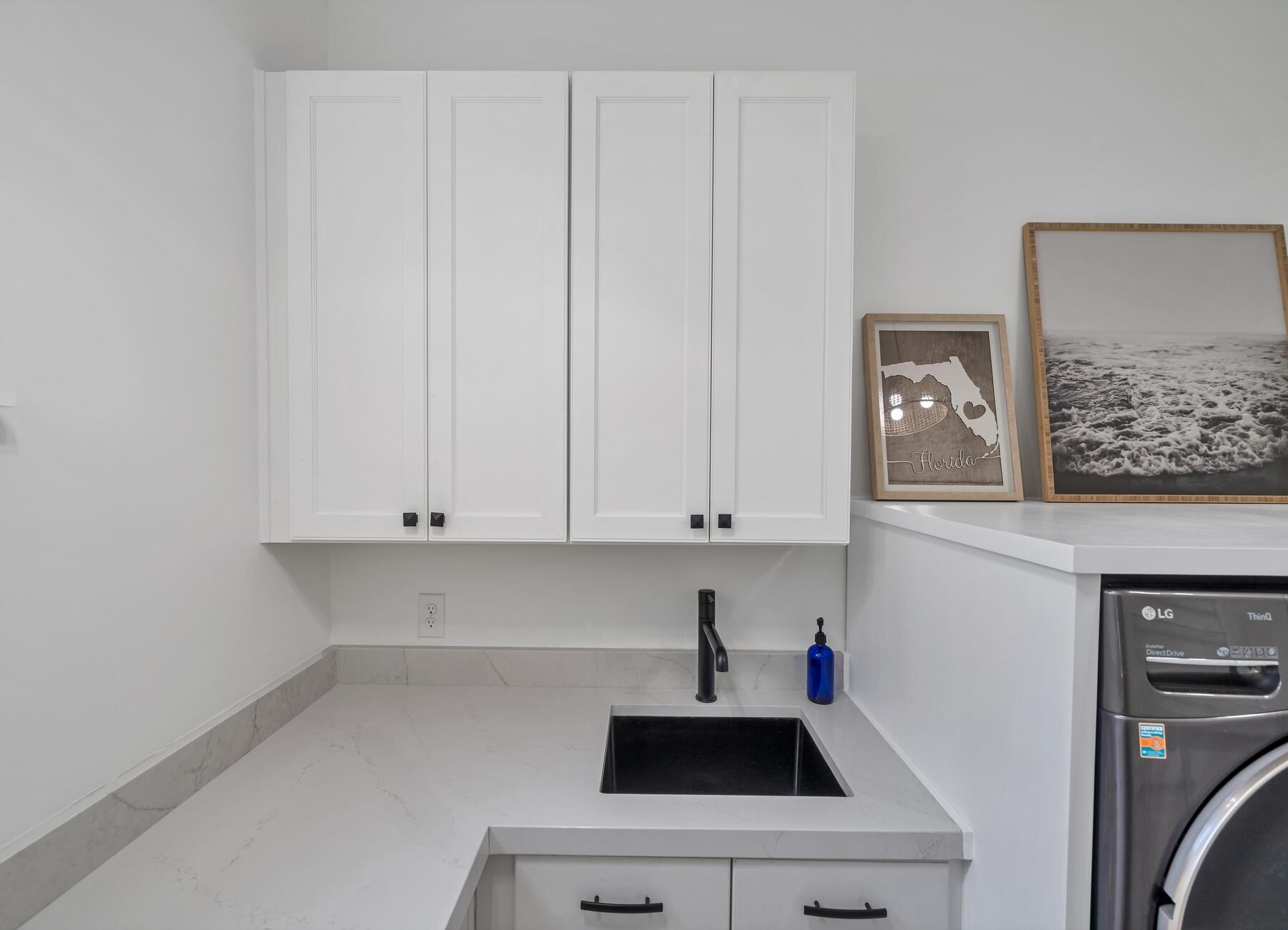 172 Baird Road Santa Rosa Beach, FL 32459 - Photo 22 of 46 a view of cabinets and wooden floor