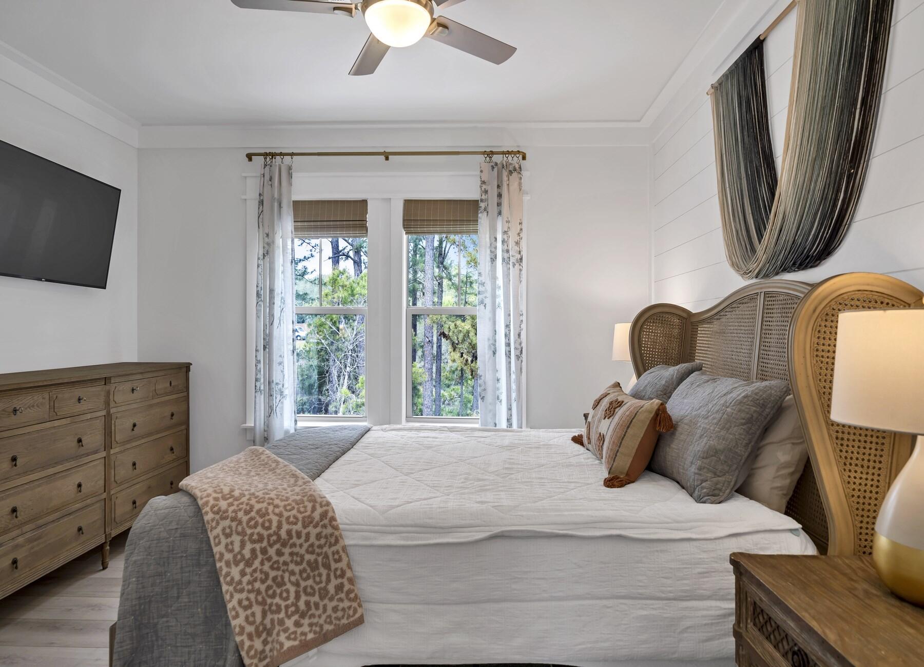 172 Baird Road Santa Rosa Beach, FL 32459 - Photo 24 of 46 a bedroom with a large bed and a window