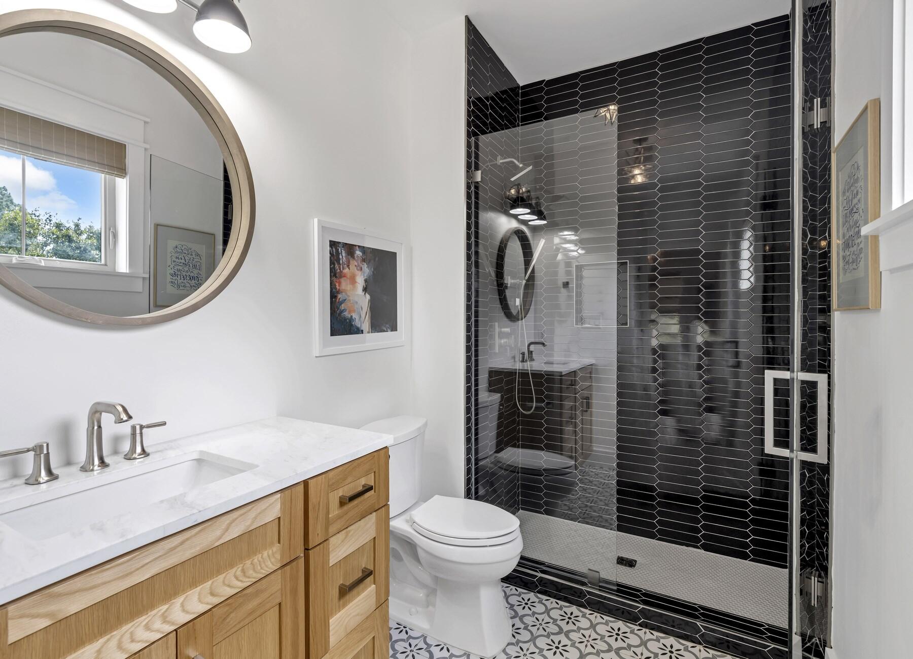 172 Baird Road Santa Rosa Beach, FL 32459 - Photo 28 of 46 a bathroom with a sink a toilet and shower