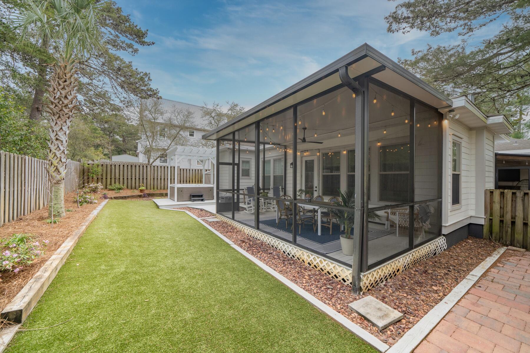 172 Baird Road Santa Rosa Beach, FL 32459 - Photo 35 of 46 a view of backyard with a tub and trees