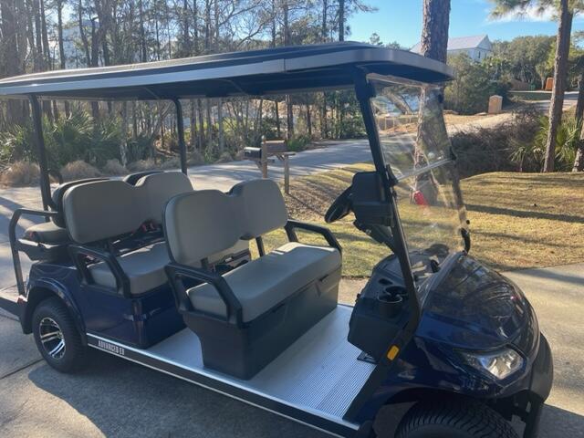 172 Baird Road Santa Rosa Beach, FL 32459 - Photo 45 of 46 a view of a balcony with chairs and a table
