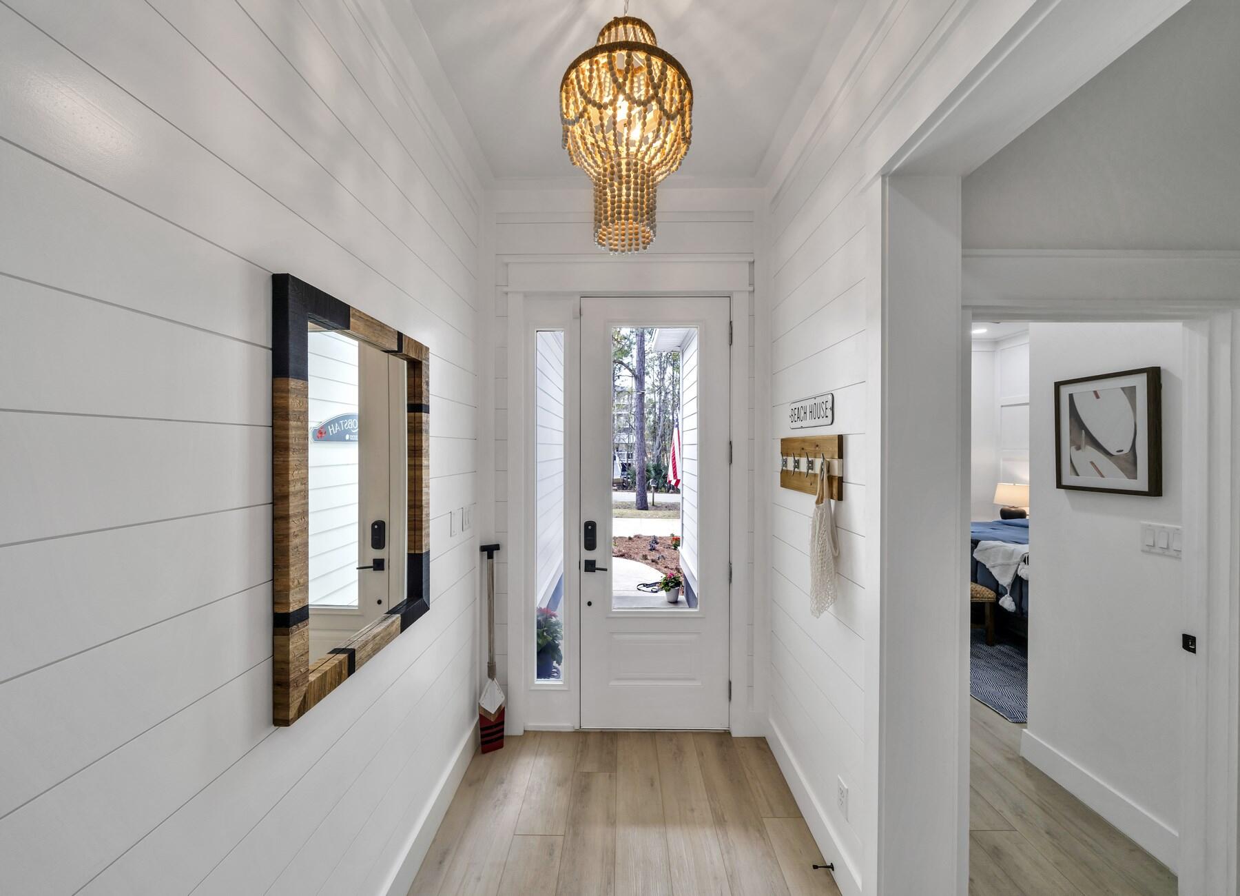 172 Baird Road Santa Rosa Beach, FL 32459 - Photo 5 of 46 a view of entryway with wooden floor