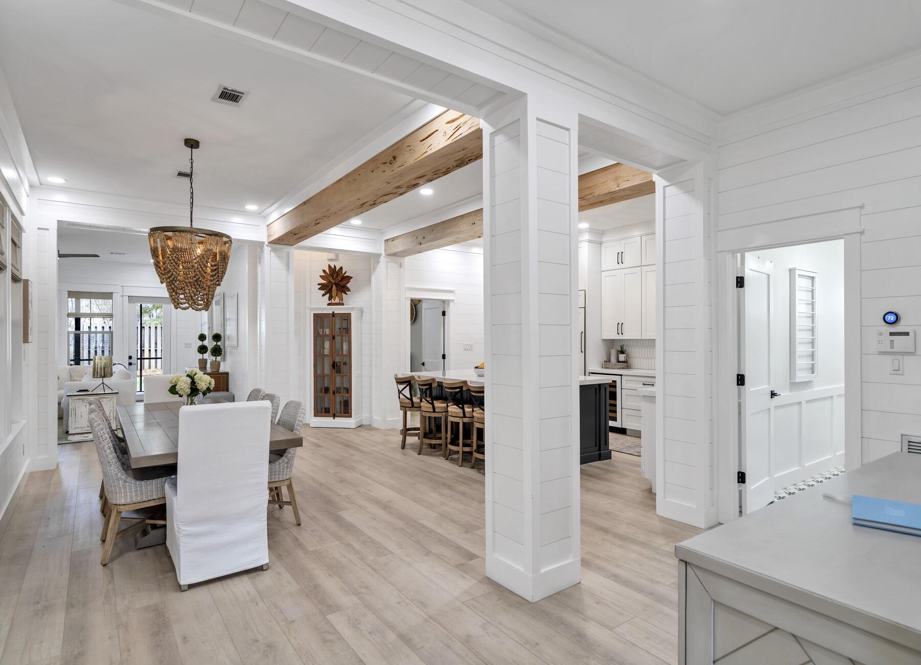 172 Baird Road Santa Rosa Beach, FL 32459 - Photo 7 of 46 a view of a dining room with furniture and wooden floor