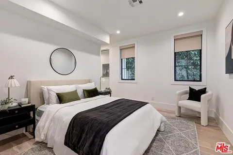 a view of a house with sitting area and furniture