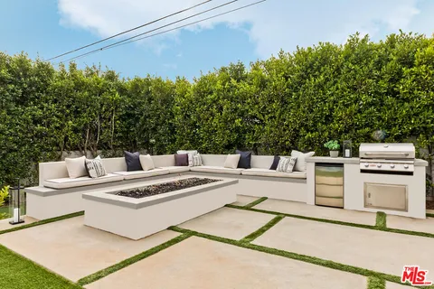 an aerial view of house with yard